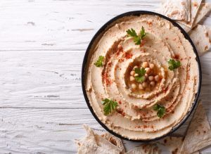 Sprouted hummus being served