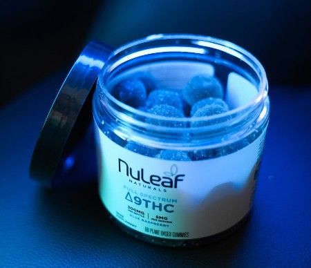 open jar of nuleaf THC gummies